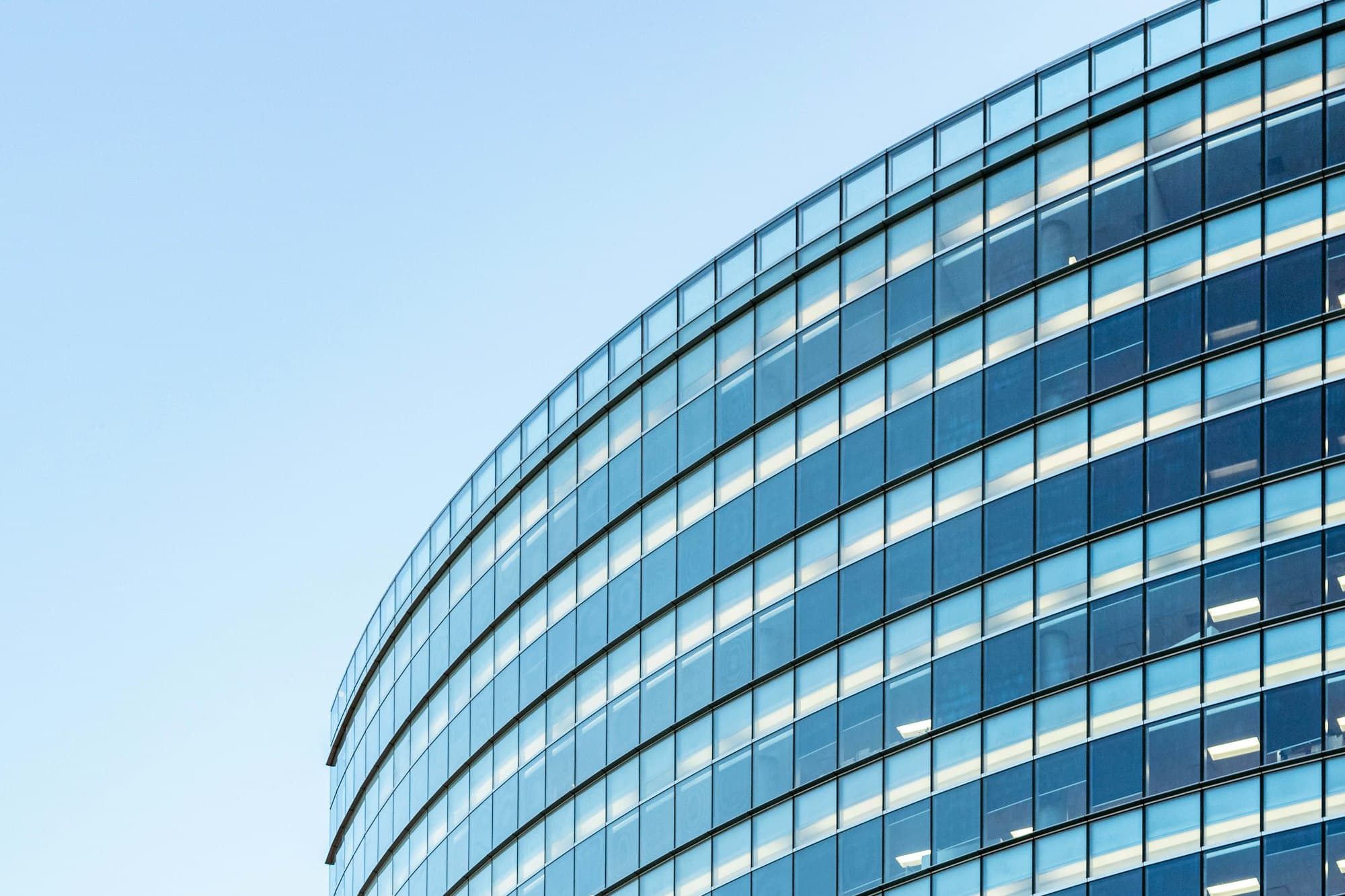 Modern glass office building representing Aurelius Group's operating structure